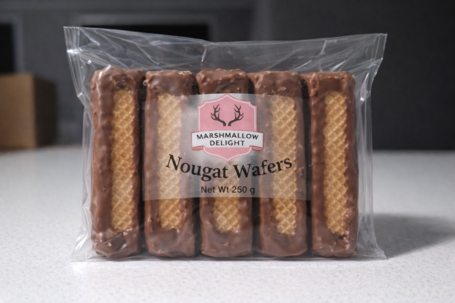 Six chocolate dipped Traditional Scottish Nougat Wafers in Marshmallow Delight packaging